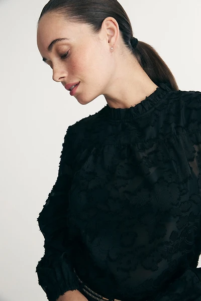 Blouse transparente à texture florale