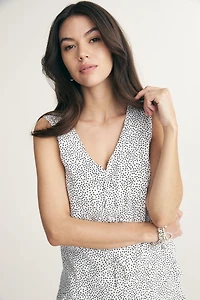 Polka dot top with bows