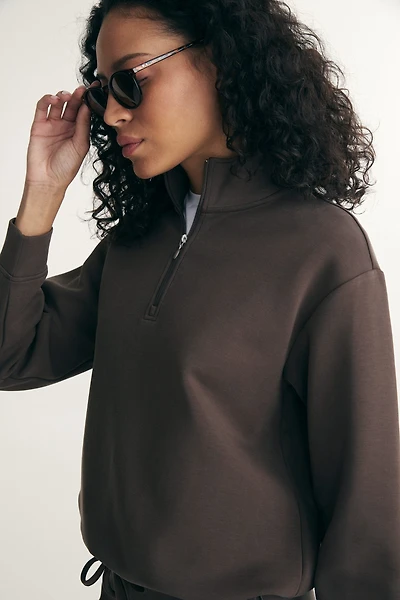 Chandail col montant à zip en ponte