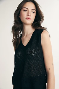 Cropped sleeveless sweater