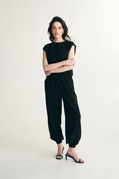 Fluid pants with fitted ankles