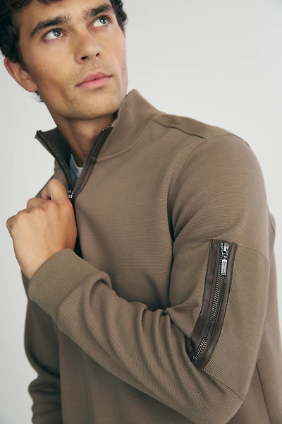 Half zip sweater with vegan leather