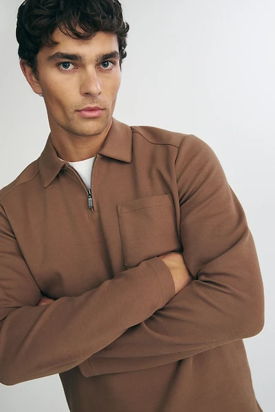 Long sleeve polo half zip with pocket