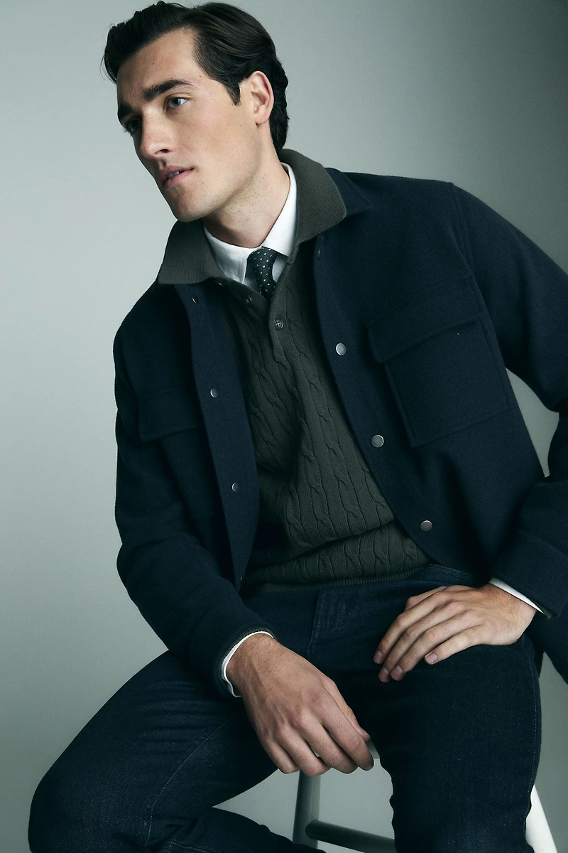 Cable-knit sweater with collar