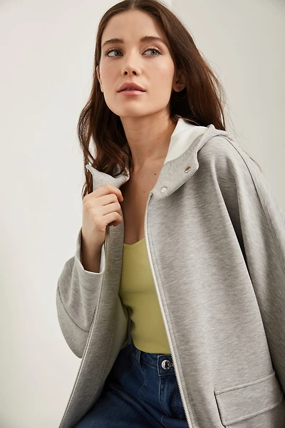 Manteau long à capuchon