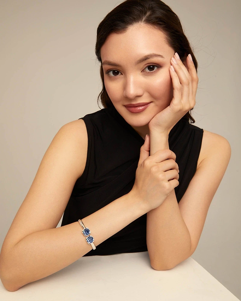 Bangle bracelet with two blue crystals
