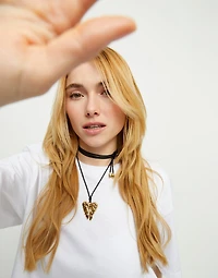 Long silk cord necklace with wing detail