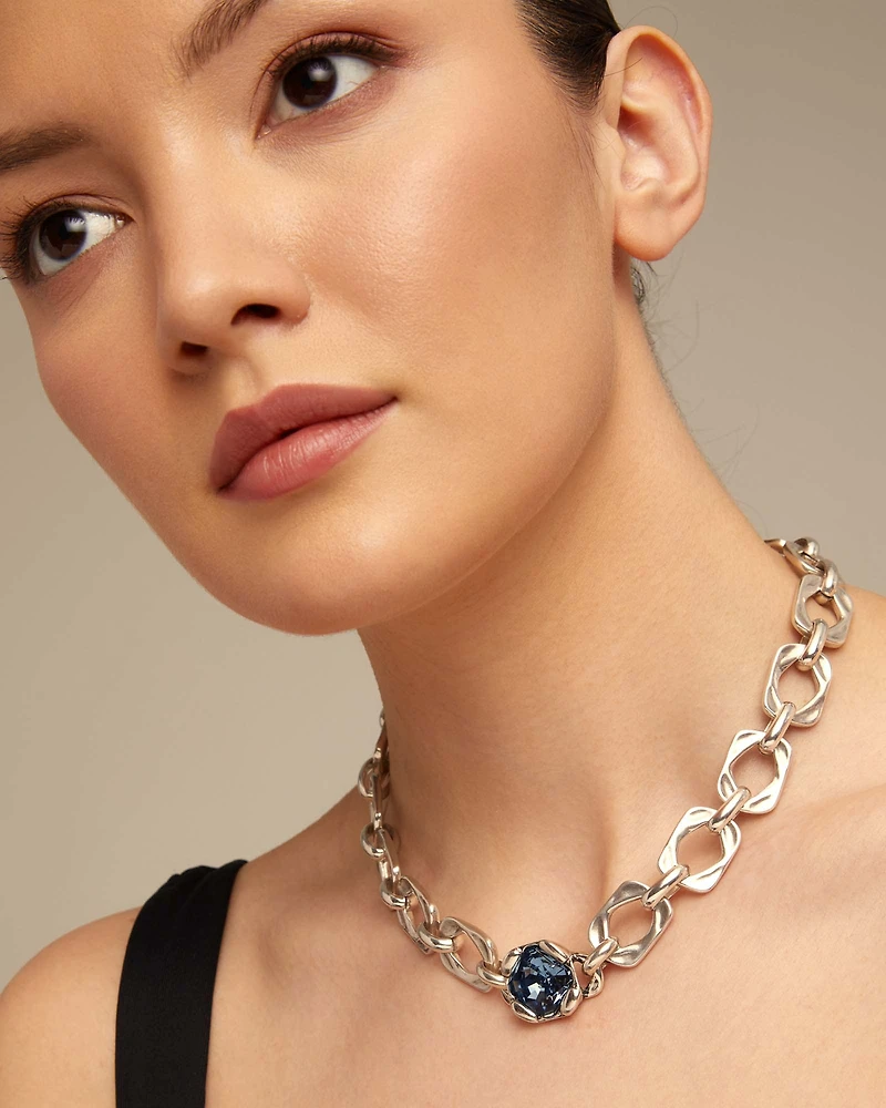 Short link chain necklace with large blue crystal