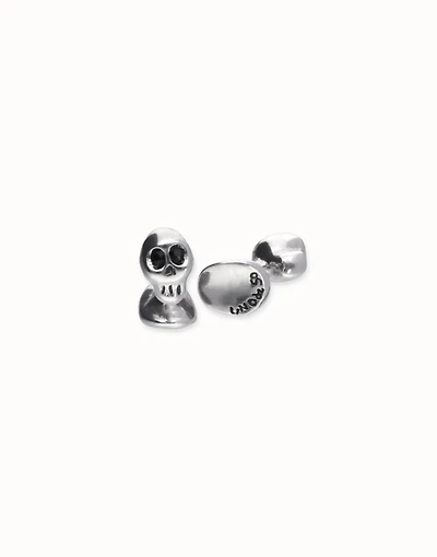 Cufflinks with faceted skull-shaped crystals