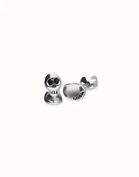 Cufflinks with faceted skull-shaped crystals