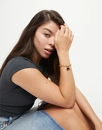 Link chain bracelet with heart charm and murano glass