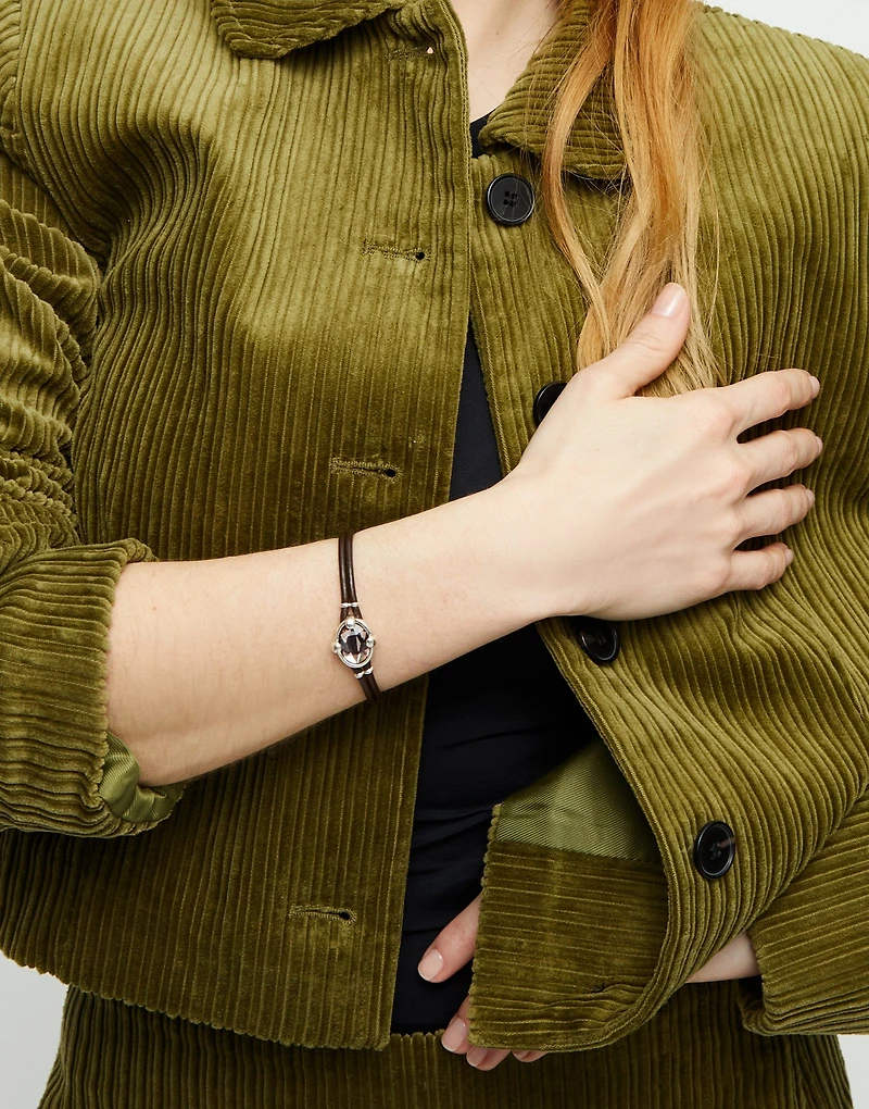 Leather bracelet with pink oval faceted crystal