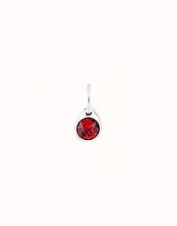 Charm with a red crystal