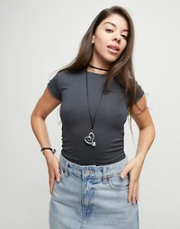 Long pendant and central heart with blue crystal