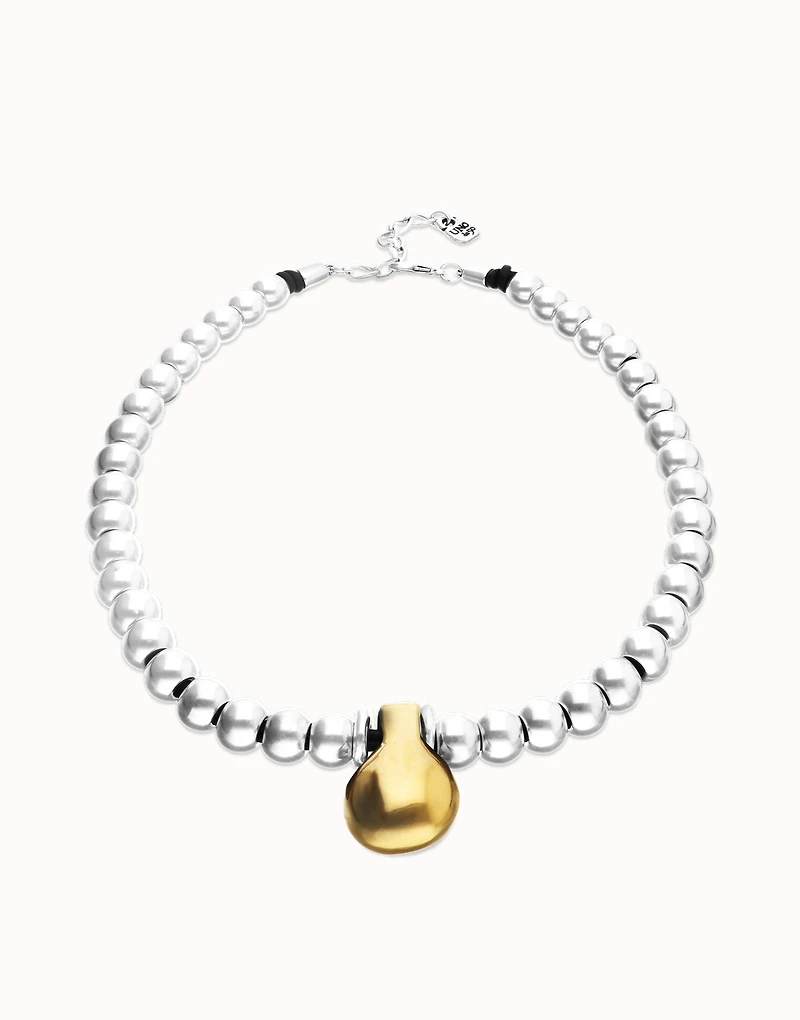 Beaded necklace with medium spheres and a large sphere