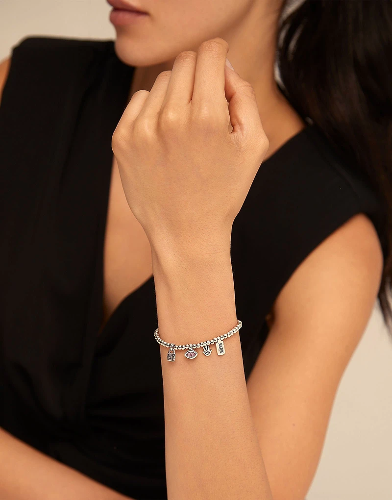 Beaded bracelet with charms