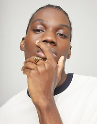 Ring with two intertwined organic shapes