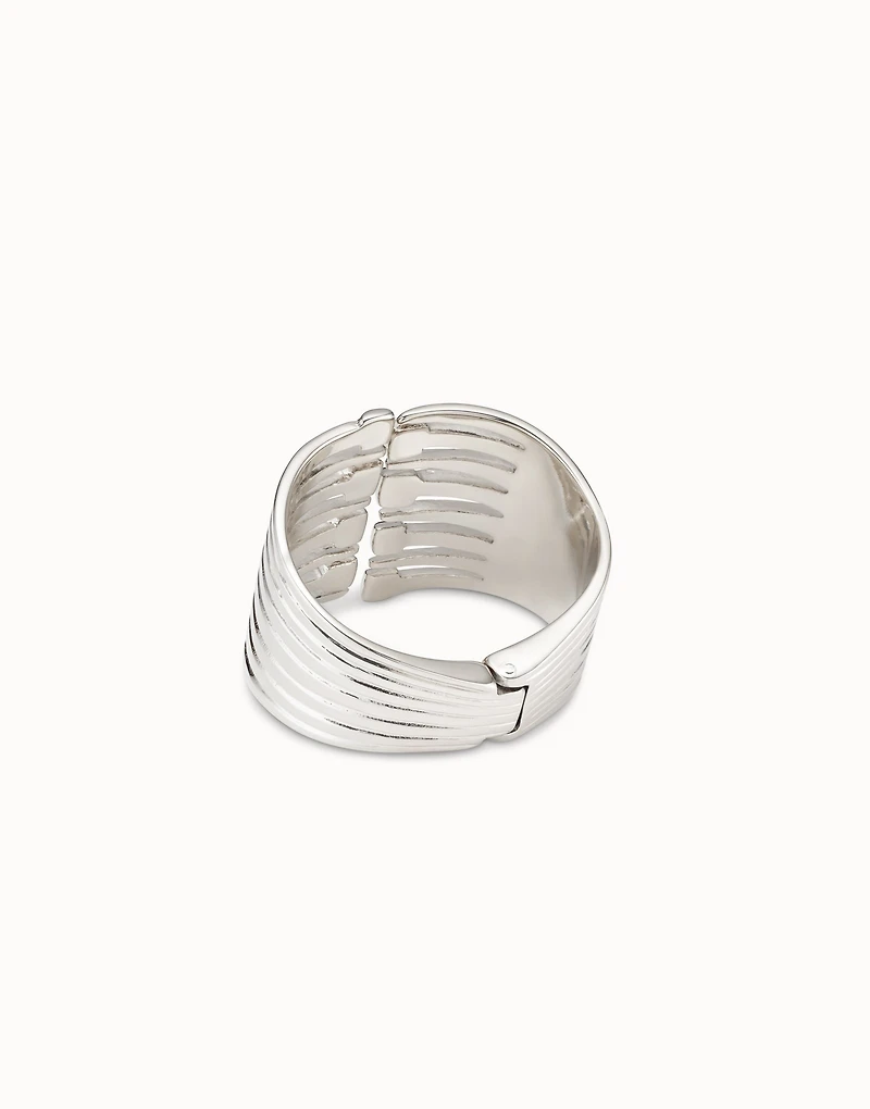 Bangle bracelet with multiple nail heads