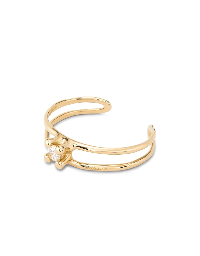 Bangle bracelet with central crystal