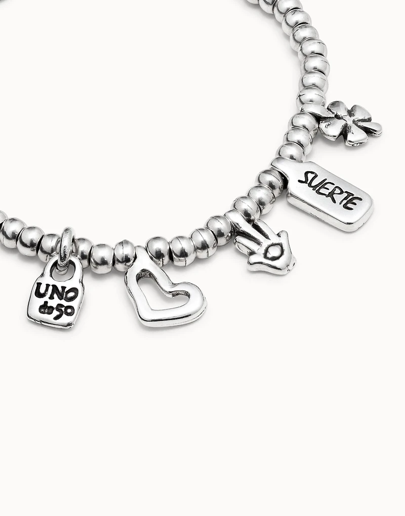 Beaded bracelet with charms