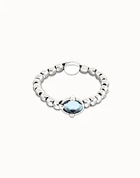 Beaded bracelet with blue oval faceted crystal