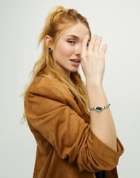 Beaded bracelet with oval faceted green crystal