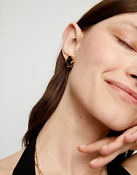 Studs with black oval faceted crystals