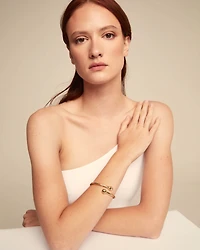 Bangle bracelet with inner spring