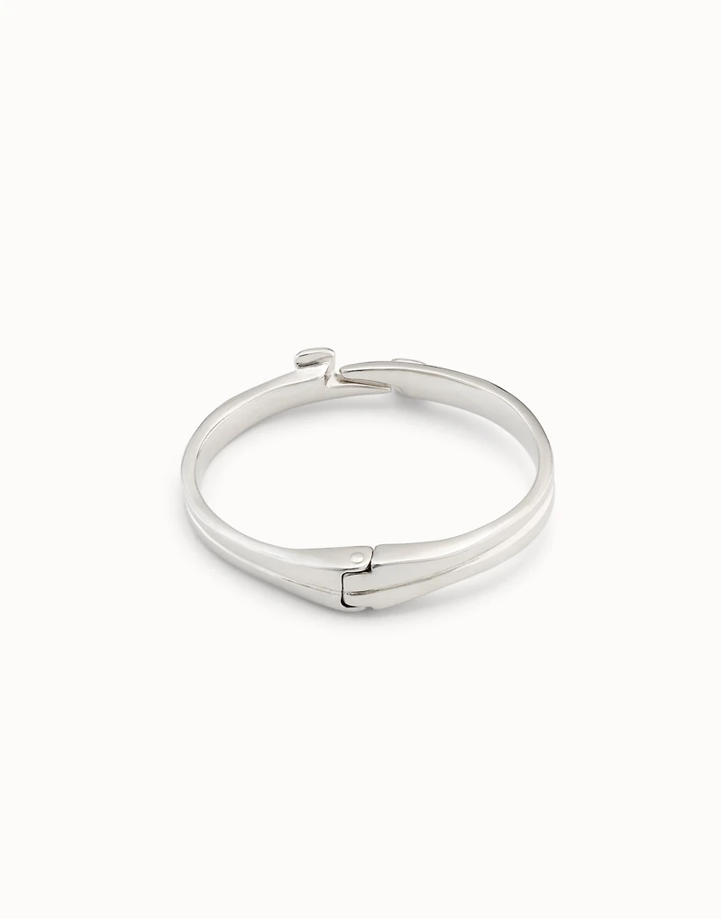 Sterling silver-plated nail shaped bracelet with hidden spring