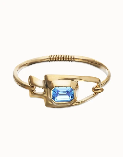 Semi-rigid bracelet with blue faceted crystal