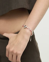 Orange silk thread and metal bracelet with starfish