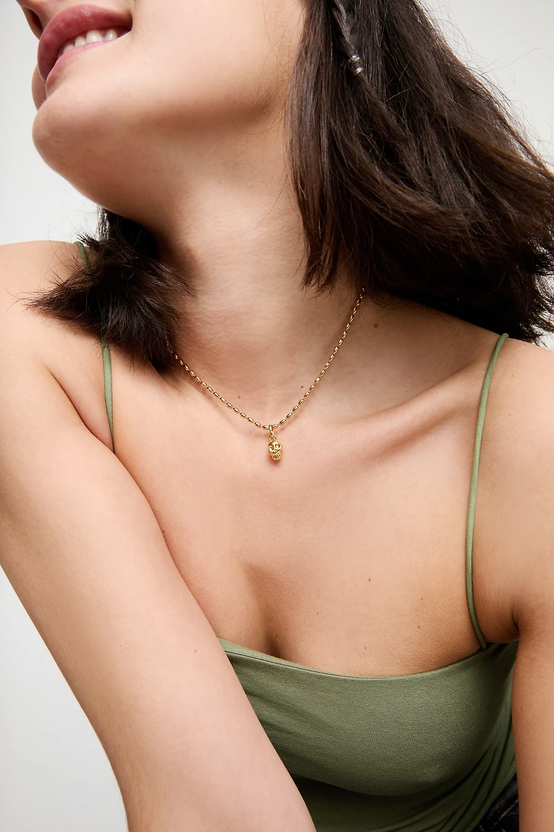 Small skull shaped charm