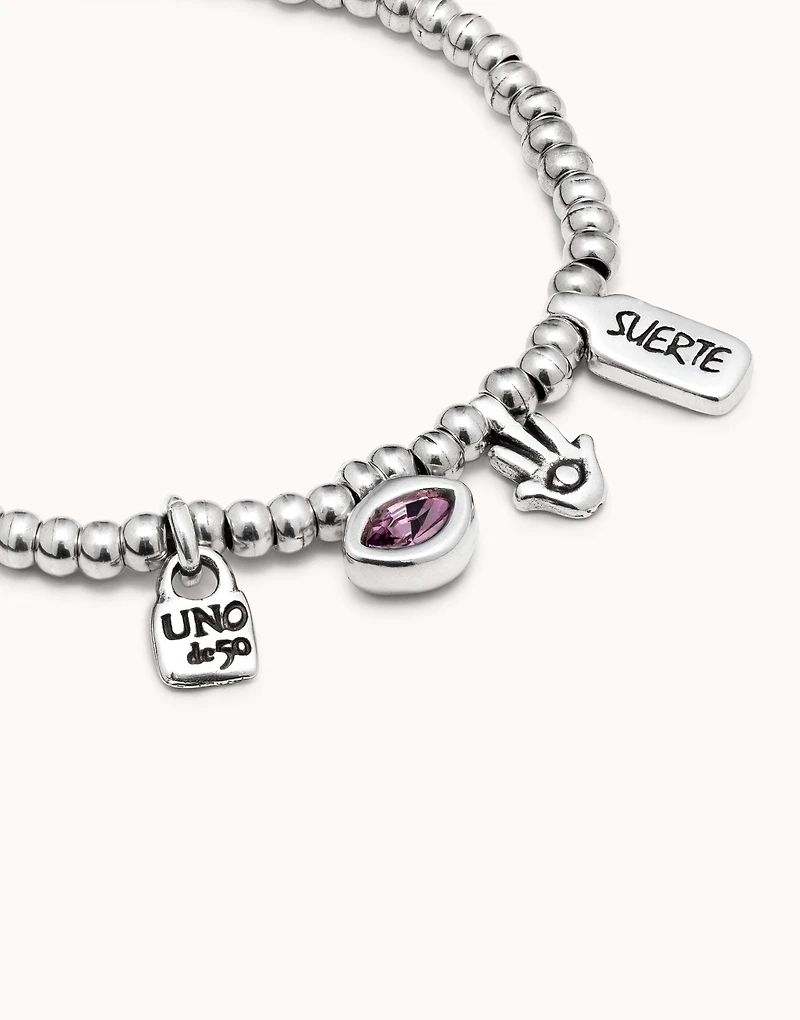 Beaded bracelet with charms