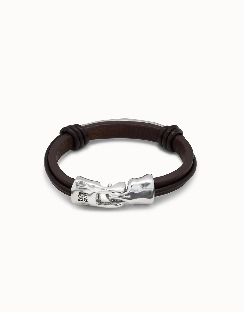 Leather bracelet with a tube in the center