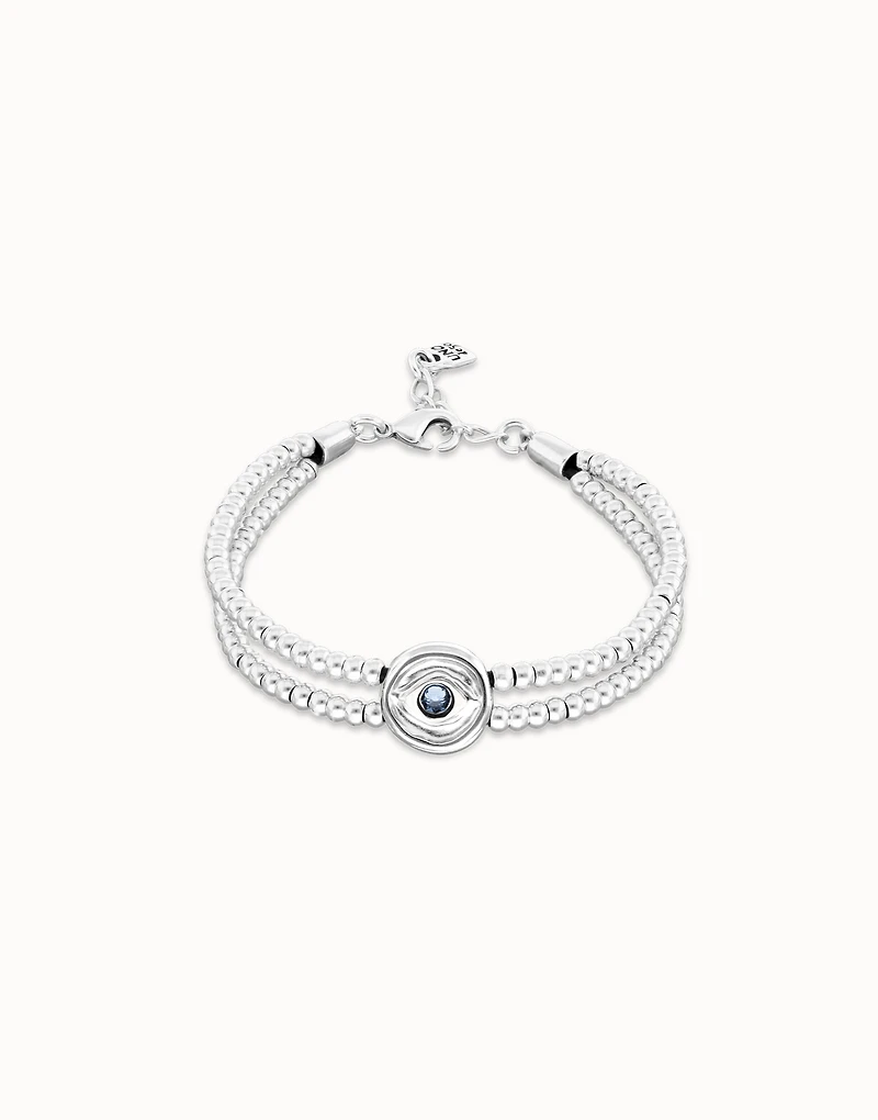 Two-strand beaded bracelet with an eye-shaped charm