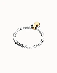 Elastic beaded bracelet with small and large beads