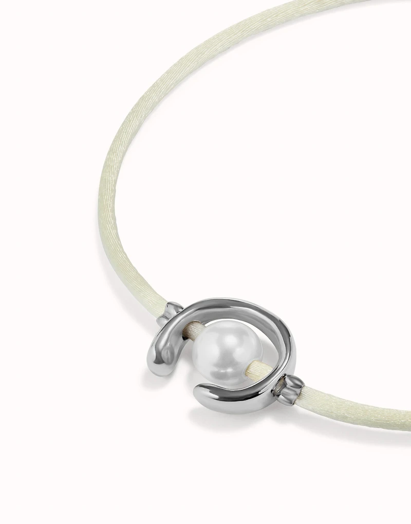 Cream cord bracelet with a pearl