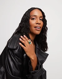 Ring with green crystal