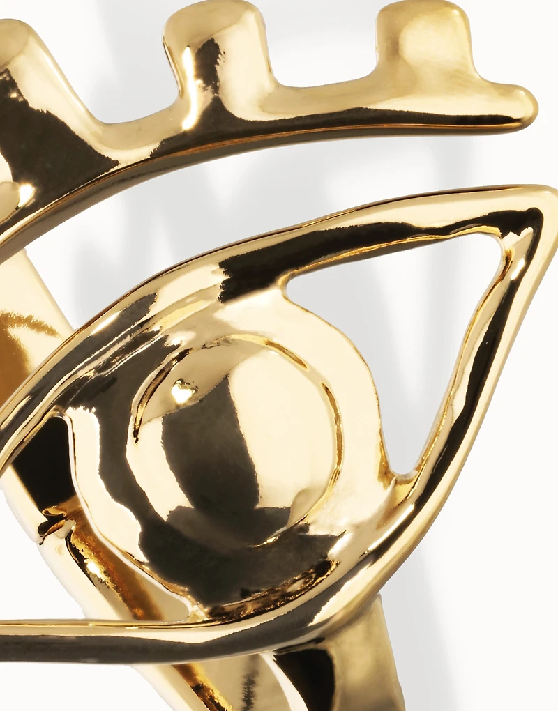 Bangle bracelet with a striking central eye