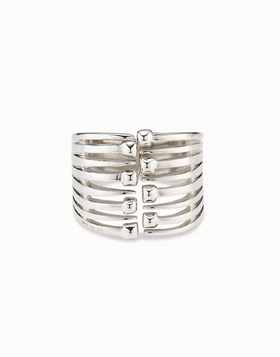 Bangle bracelet with multiple nail heads
