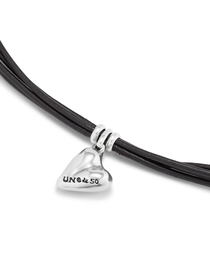 Leather bracelet with a heart charm
