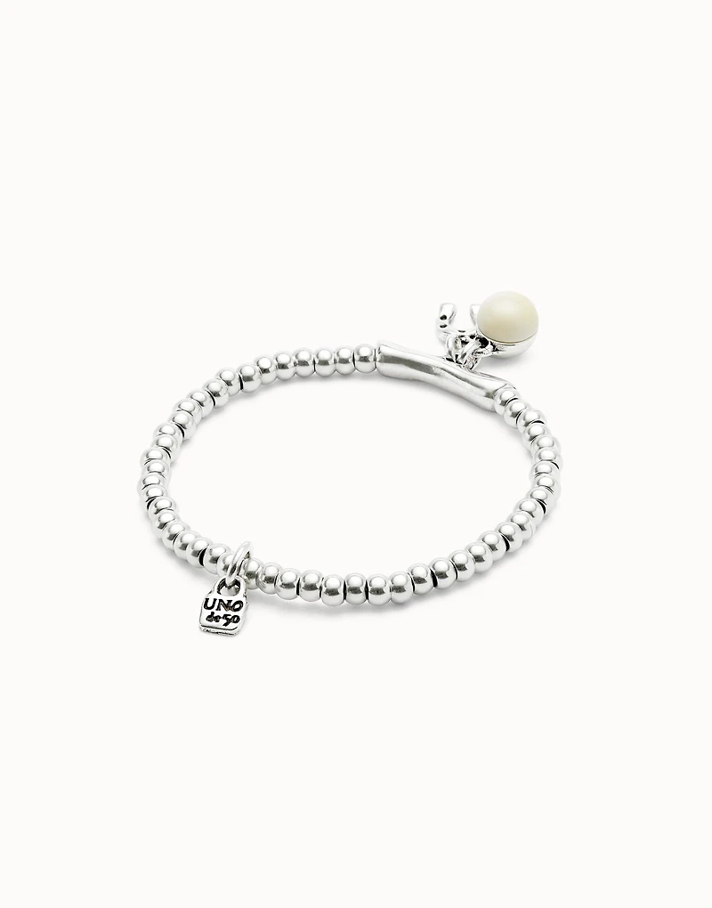 Beaded stretch bracelet with a murano glass and a horseshoe charm