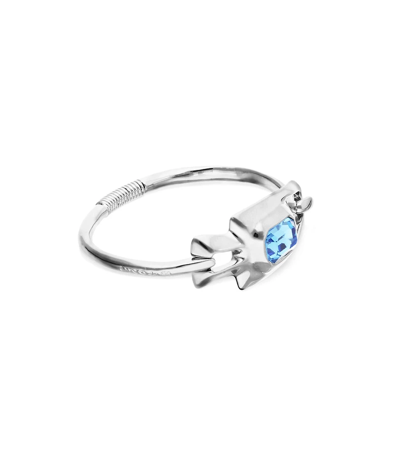 Semi-rigid bracelet with blue faceted crystal