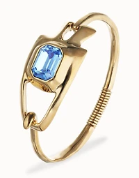 Semi-rigid bracelet with blue faceted crystal