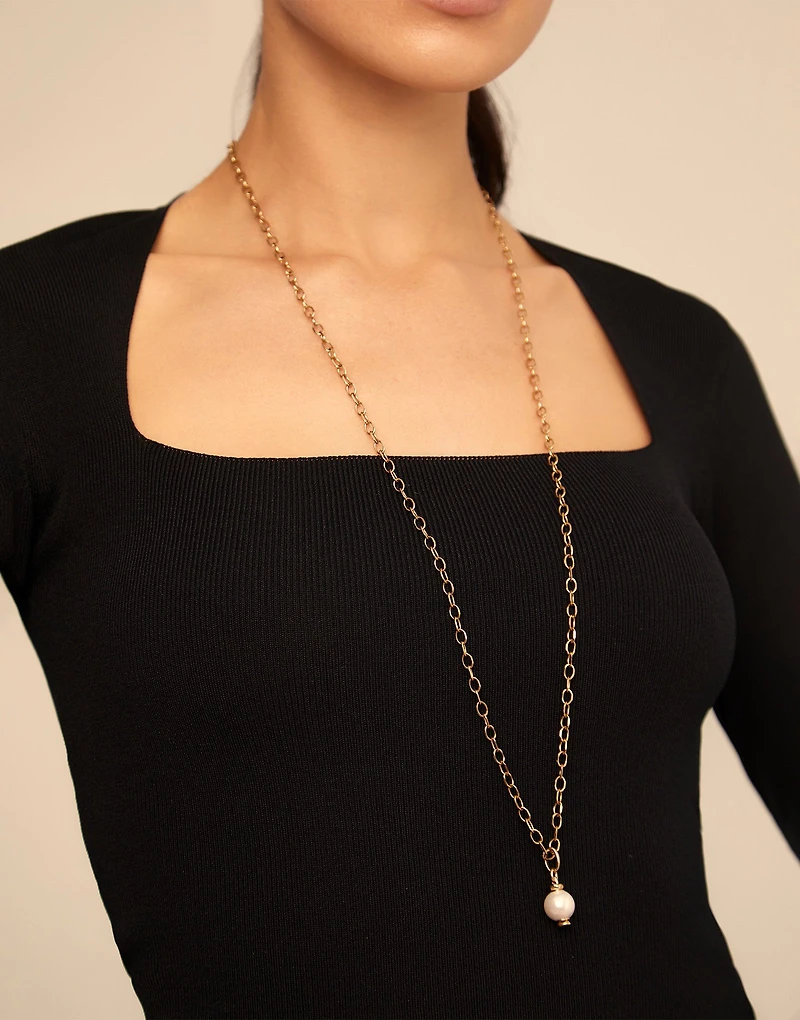 Charm with white pearl