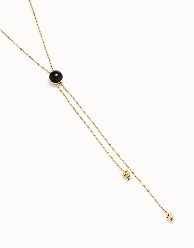 Long pendant necklace with central black murano glass