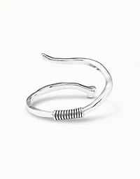 Bangle bracelet with a spiral-shaped nail