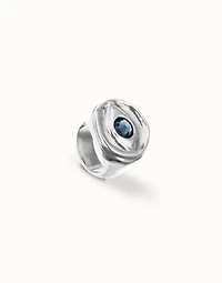 Eye-shaped ring with faceted blue crystal