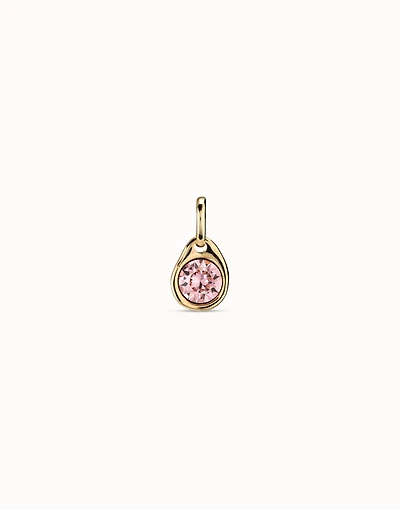 Charm with a pink crystal
