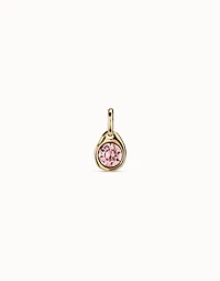 Charm with a pink crystal